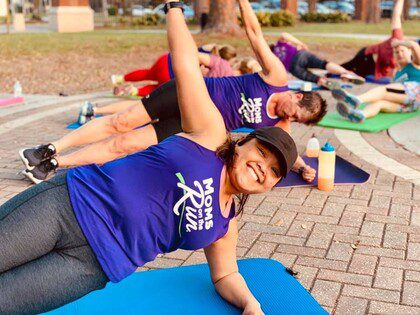 MOTR members participate in side planks