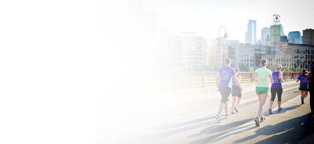 moms on the run is in many locations, including these women running in downtown Minneapolis
