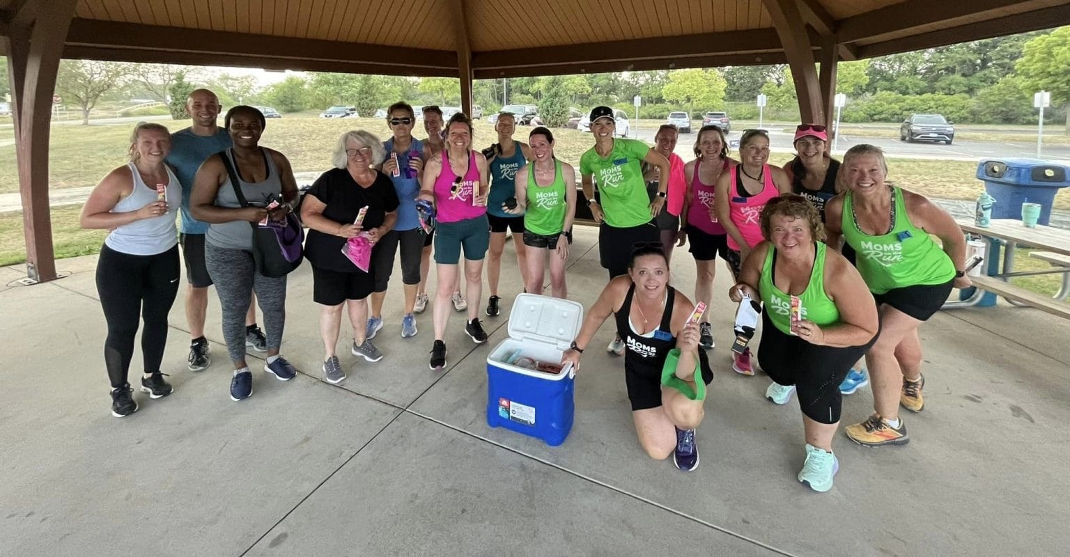 group of women in pavilion with cooler