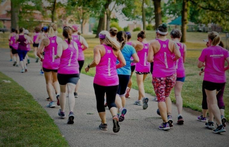 A large group of MOTR members running in a pack
