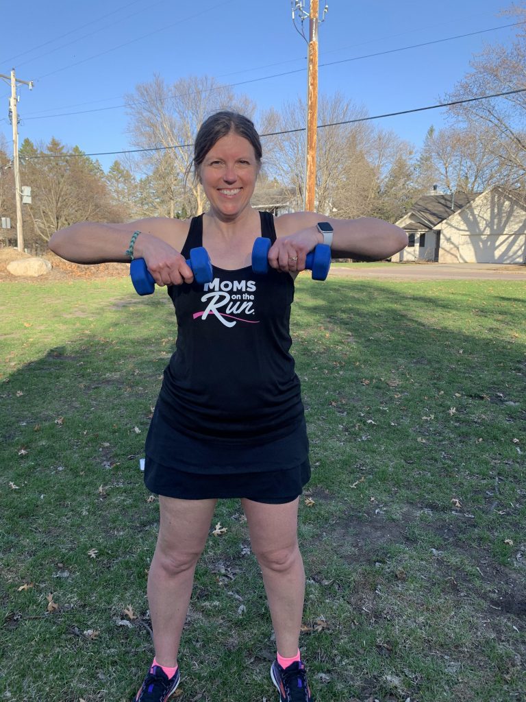 woman with weights - gear needed for MOTR classes