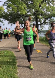 Shakopee owner, Angie, running a 5K-10k Race