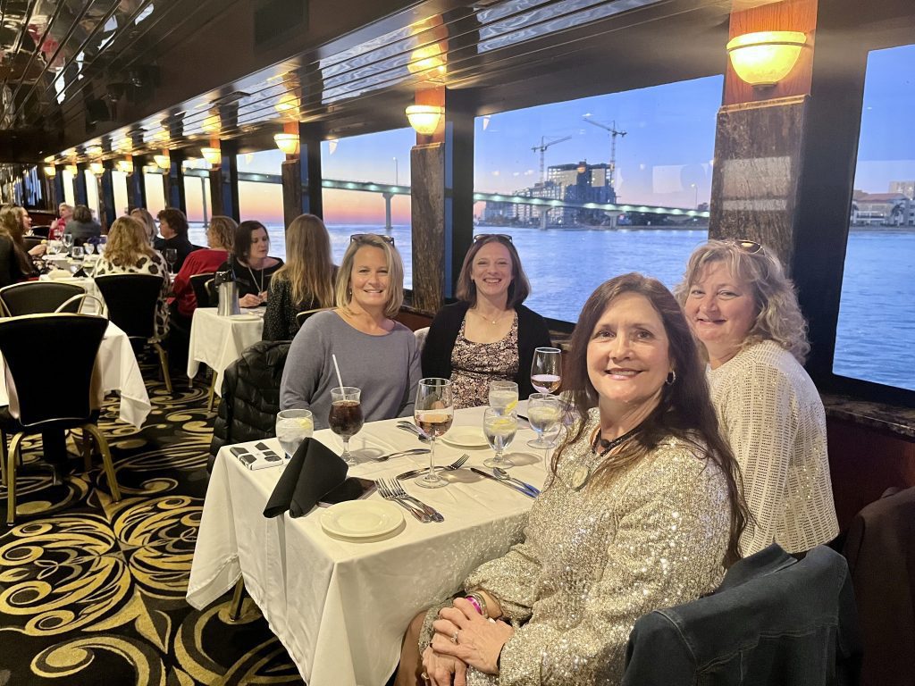 women on a destination race weekend cruise boat