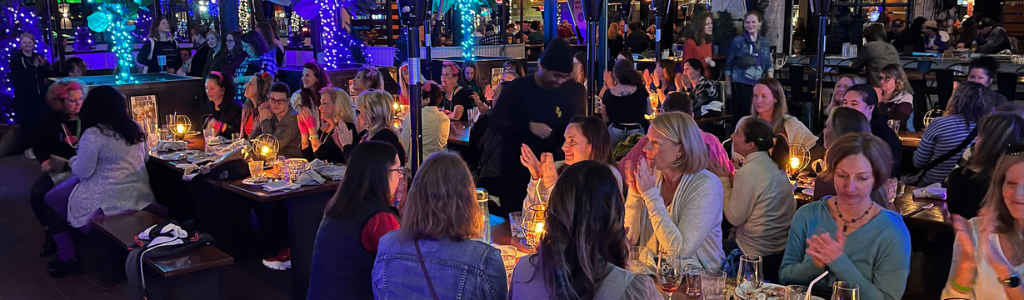 Group of members having drink and dinner