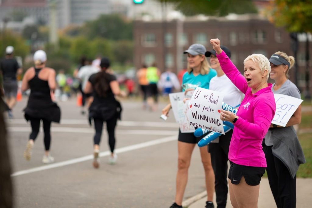 MOTR members cheering at a race