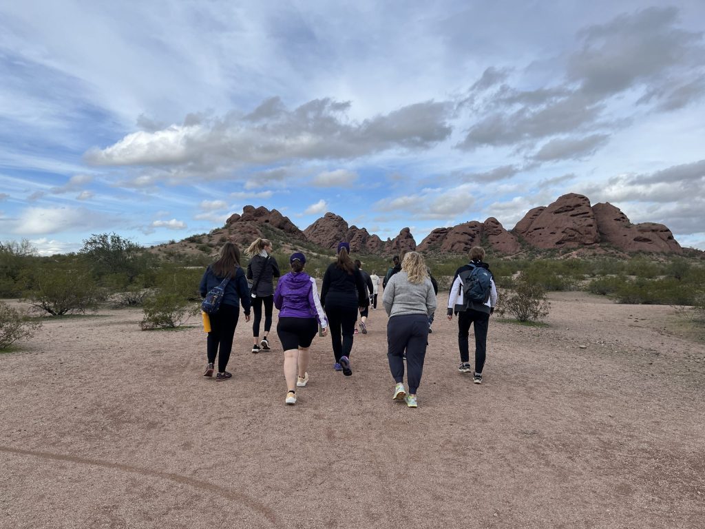MOTRs hiking through a desert in arizona