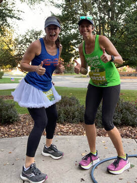 2 Coon Rapids Bunker Hills members giving a thumbs up