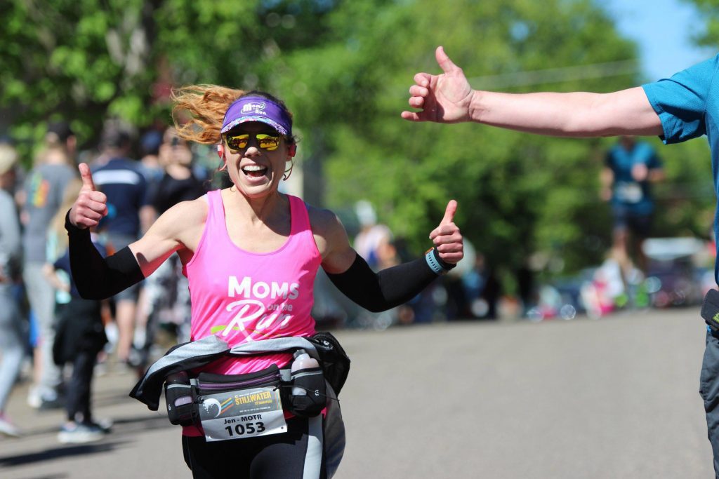 MOTR running a race giving thumbs -ups