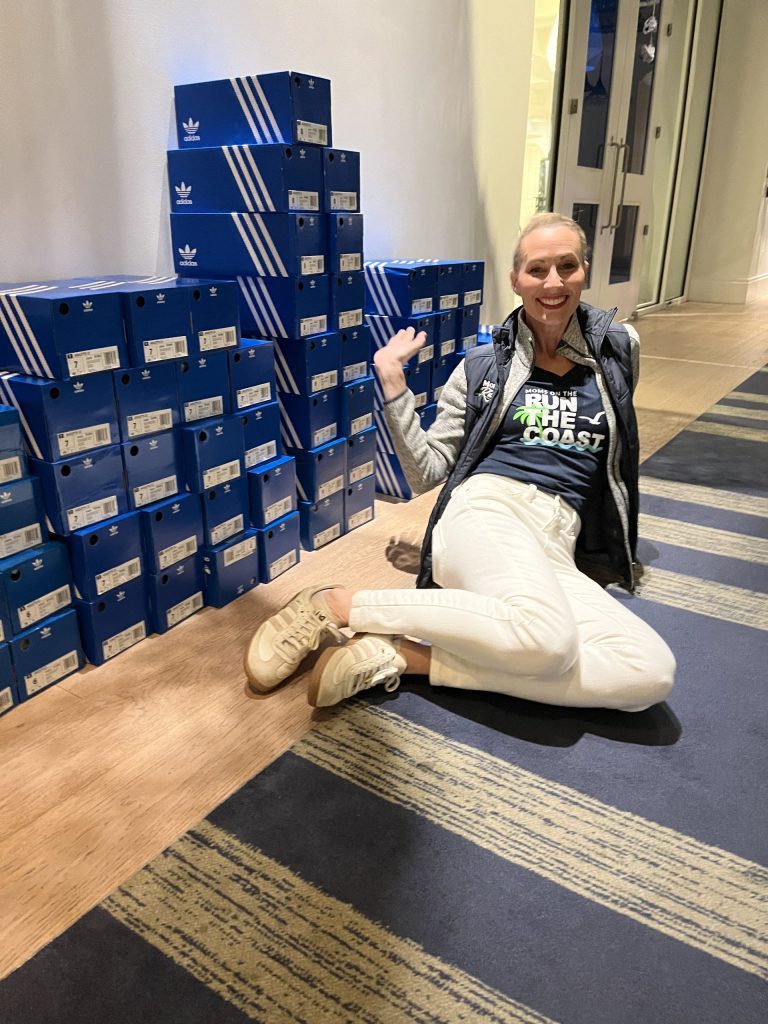 Carrie with boxes of shoes