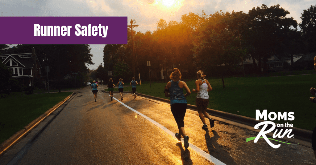 Two women in foreground running away from camera with sun setting in background and words Runners Safety in left corner