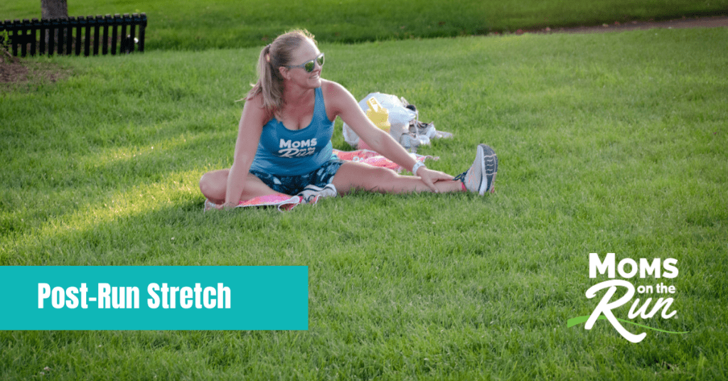 Runner stretching in grass