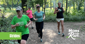 Runners on trail in woods