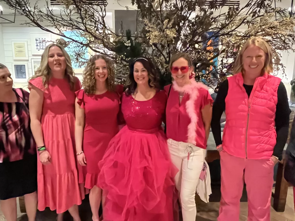 A group of MOTR members wearing pick