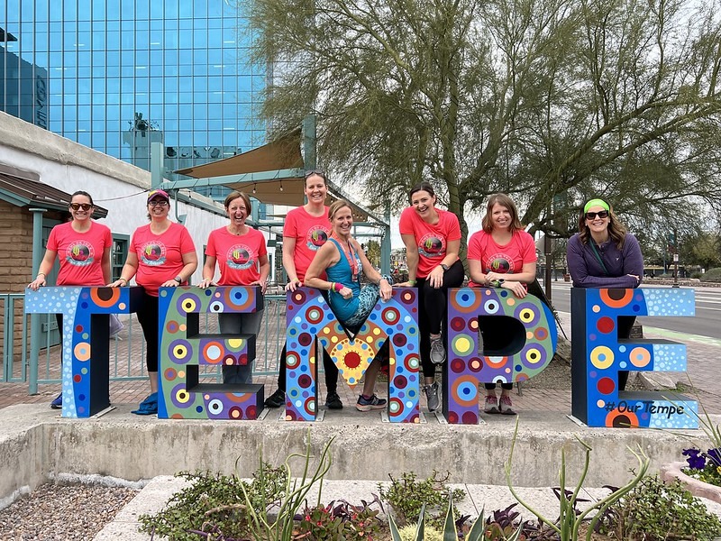 Women in orange shirts in Tempe