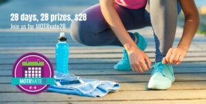 woman tying shoes with water bottle and phone