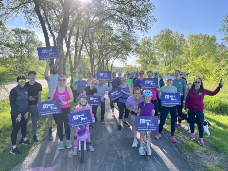 Lakeville members holding MOTR signs