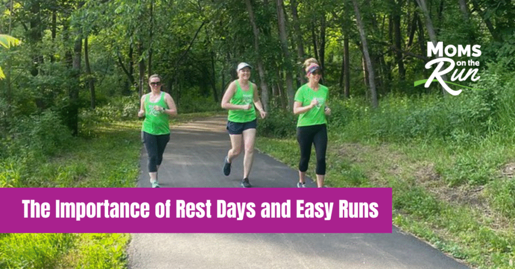 three women running in green shirts on path through trees with words Importance of Rest Days and Easy Runs