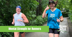 two women runners smiling