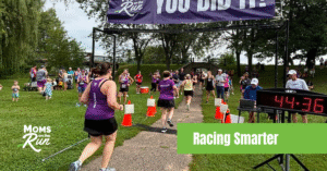runners in purple shirts at finish line