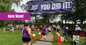 female runners crossing finish line