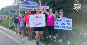 women cheering on runners
