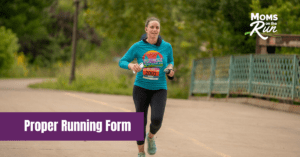 female running on paved trail