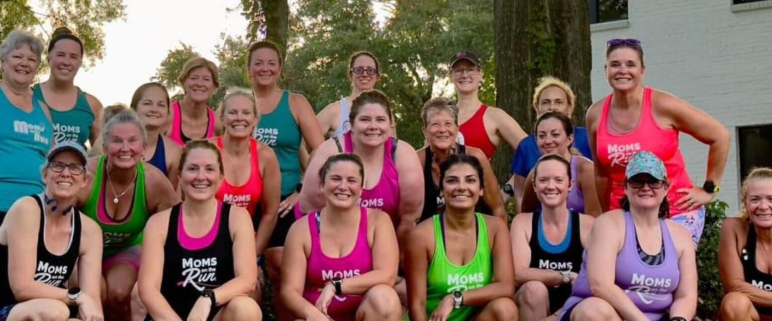 women runners in multi-colored shirts