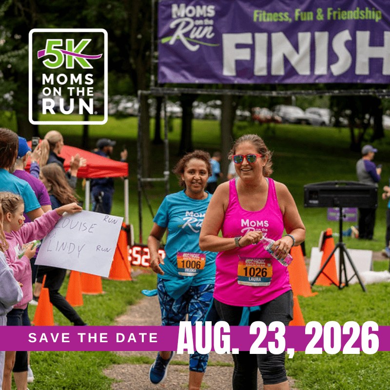 runners at finish line with save the date