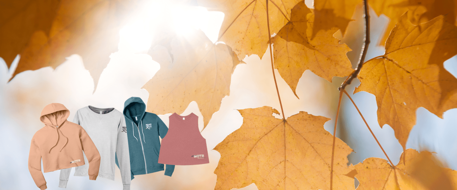 golden fall leaves in background with MOTR new merchandise