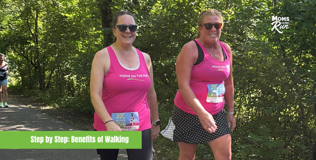 two women walking on trail